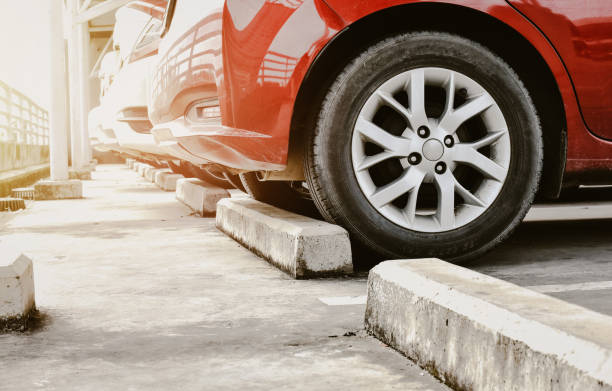 Parking cement barrier in the parking lot Parking cement barrier in the parking lot for accident protection bumper stock pictures, royalty-free photos & images