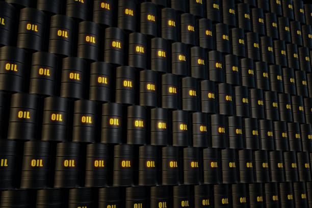 stacked black oil barrels. the word oil is painted in yellow. - opec 個照片及圖片檔