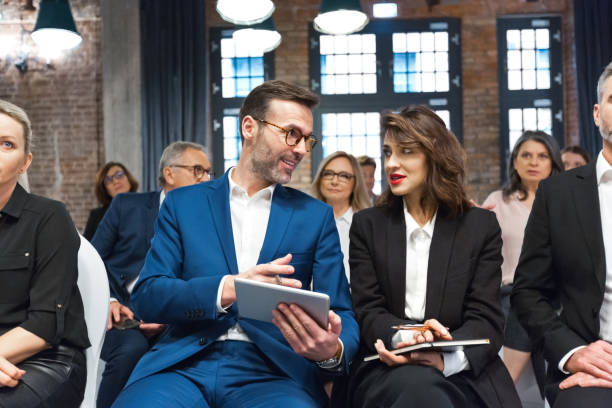 istock Business people during seminar 1353977157