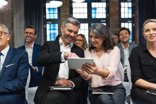 istock Business people during seminar 1353977266