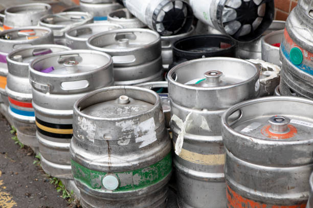 istock Metal beer barrels on the pavement 1353977551