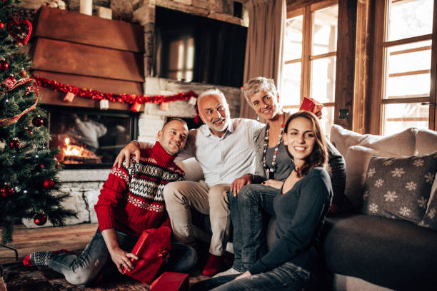 istock happiness two generation family on the sofa for christmas 1353981767