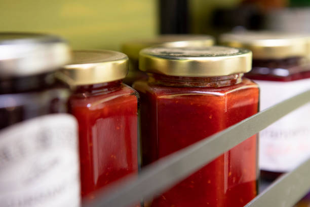 Jars on a shelf in a kitchen at home
