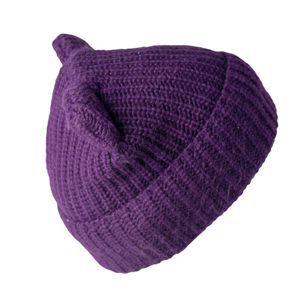 istock women's hat knitted isolated on white background. warm winter accessory 1353987954