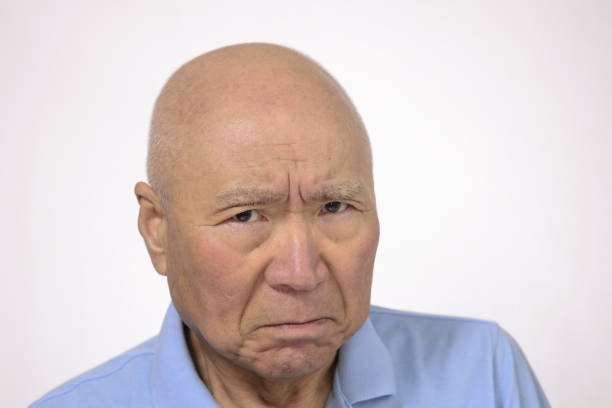 Angry Japanese senior face
