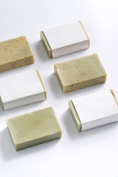 istock Soap wrap box mock-up package with bar olive soap on white background 1353989166