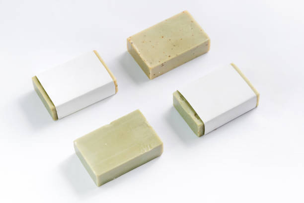 istock Hand made olive soap bars on white background, top view. Mockup for design 1353989301