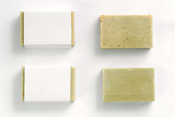 istock Soap wrap box mock-up package with bar olive soap on white background 1353989655