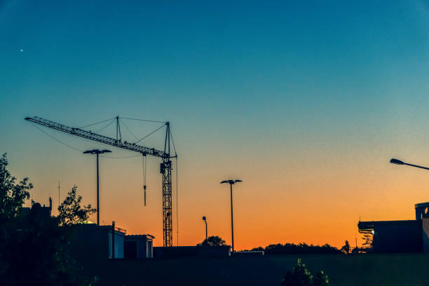 istock View of a construction site in the setting sun. 1353990327
