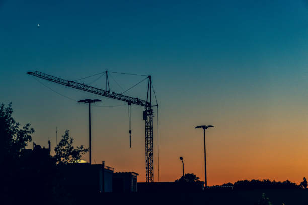 istock View of a construction site in the setting sun. 1353990490