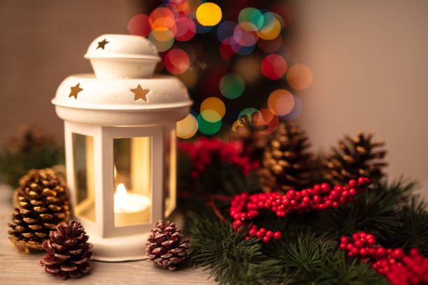 istock Christmas lantern on wooden table 1353992085
