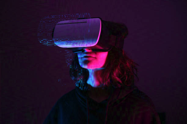 istock Woman wearing VR Glasses 1353994205