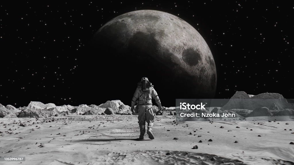 Following Shot of Brave Astronaut in Space Suit Confidently Walking on Space Planet Towards Moon, Covered in Rocks. First Astronaut On the Space Planet. Big Moment for the Human Race. Advanced Technologies, Space Exploration/ Travel, Colonization Concept. Following Shot of Brave Astronaut in Space Suit Confidently Walking on Space Planet Towards the Moon. Moon as viewed from Moon surface. The surface of the moon, strewn with small rocks and sand. Flight over Moon craters. Moon surface, Desert, Cliffs, sand. Covered in Rocks. First Astronaut On the Moon Surface. Big Moment for the Human Race. Advanced Technologies, Space Exploration/ Travel, Colonization Concept. Moon Surface Stock Photo