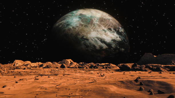istock Space Planet seen from Mars surface. The surface of Mars, strewn with small rocks and red sand. Martian landscape in rusty orange shades, Mars Planet surface, Desert, Cliffs, sand. Red planet mars. Conception space abstract background. 1353996865