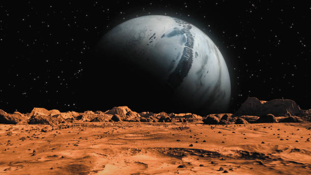istock Space Planet seen from Mars surface. The surface of Mars, strewn with small rocks and red sand. Martian landscape in rusty orange shades, Mars Planet surface, Desert, Cliffs, sand. Red planet mars. Conception space abstract background. 1353996873