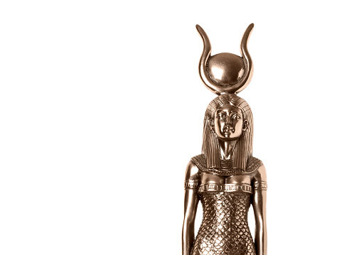 Bronze statuette of Isis isolated on white background.