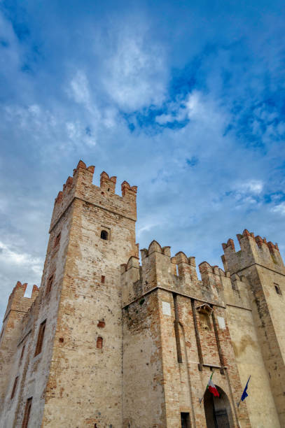 Sirmione, Italy, October 19, 2019: Castello di Sirmione - a fortress from the Scaliger era. Access point to the historical centre of Sirmione on Lake Garda.