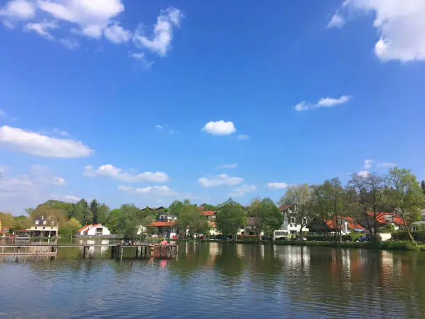 Clear blue sky in a summer afternoon at Lake Klostersee in Ebersberg, a small town near Munich in Bavaria, Germany