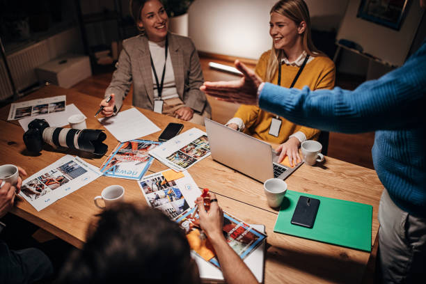 istock Team of journalists working late 1354000139