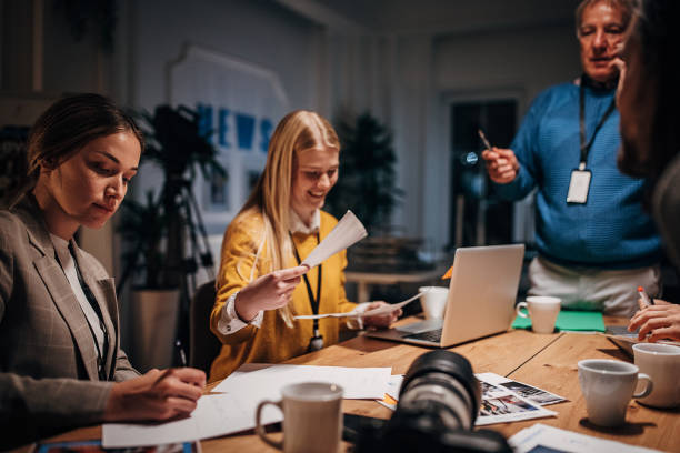 istock Busy night in news editorial office 1354001158