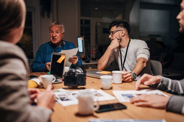 istock Work night in news editorial office 1354001751