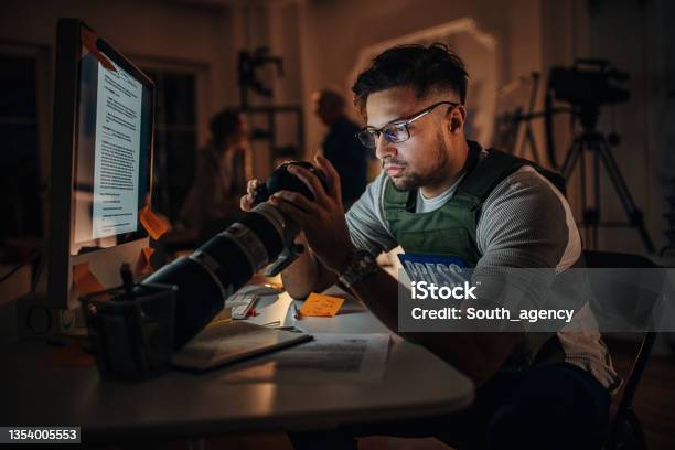 Photographer In News Editorial Office Stock Photo - Download Image Now - Reportage, Journalist, Camera - Photographic Equipment