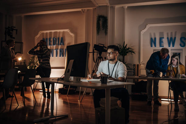 istock Journalists in news editorial office 1354018639