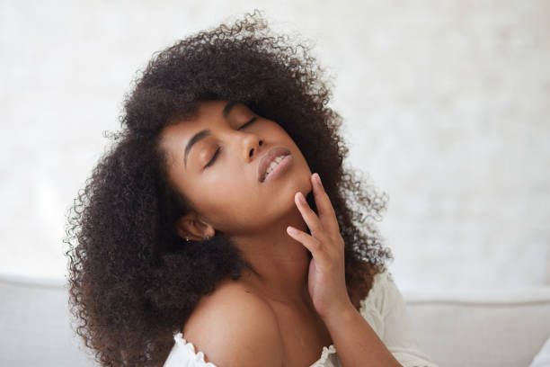 istock Attractive black woman with a beautiful smile, teeth, and complexion. 1354018997