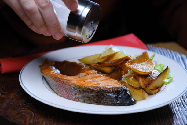istock Serving and eating salmon steak and potato 1354022318