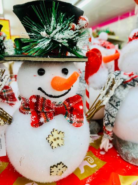 istock snowman and christmas tree decoration 1354023291