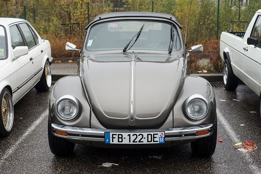 Mulhouse - France - 14 November 2021 - Front view of grey Volkswagen beetle parked in the street