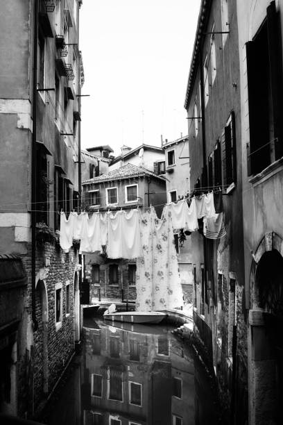 istock Clothes hanging on a canal of Venice 1354025855