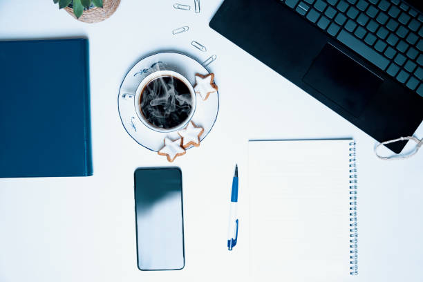 istock Workplace with hot coffee for good start 1354027115