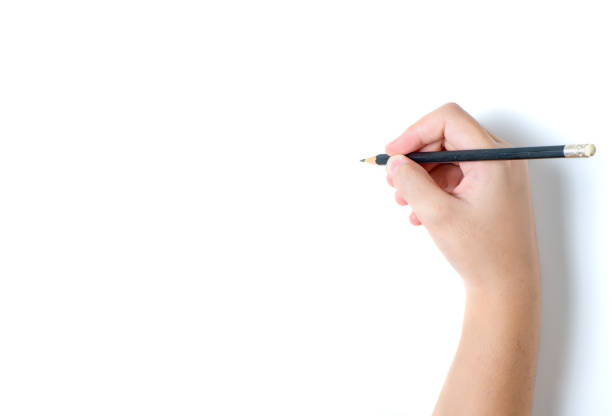 istock Little hand is ready for drawing with pencil isolated 1354027195