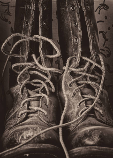 istock Old high top leather untied boots 1354027395