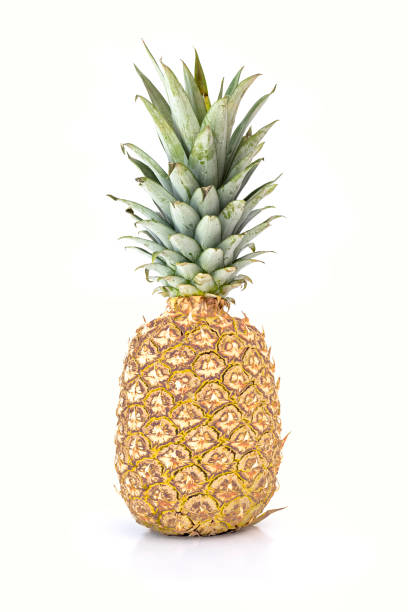 istock Pineapple in gold isolated on white background 1354027821