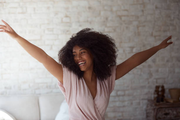 istock A satisfied mixed-race woman enjoys rhythmic movement 1354030333
