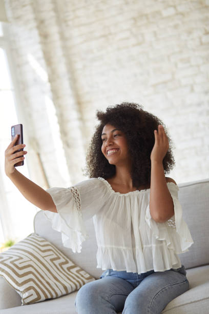 istock Black student talking to web camera during remote online distance video call. 1354031259