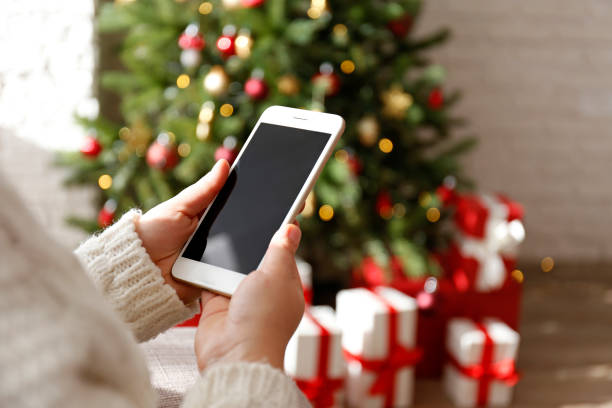 istock Woman holding a phone 1354031267