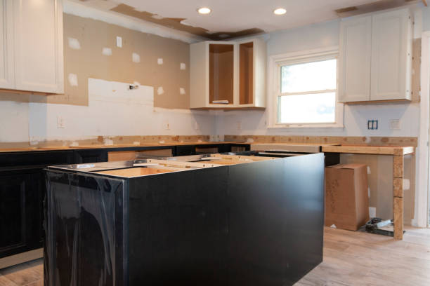 istock New cabinets and island being installed in a residential kitchen 1354032439