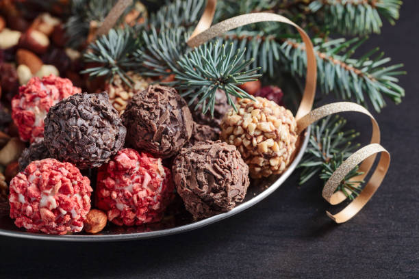 istock Chocolates and a fir branch. 1354032763