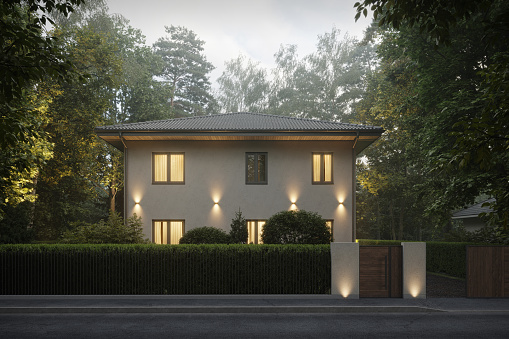 3d rendering of modern bungalow surrounded by a trees. Digitally generated image of a house in luxurious style on a summer day.