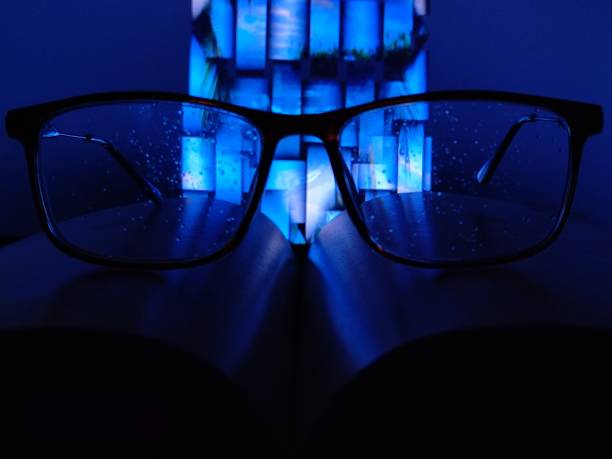 istock Spectacle Or glasses on book with beautiful background 1354039743
