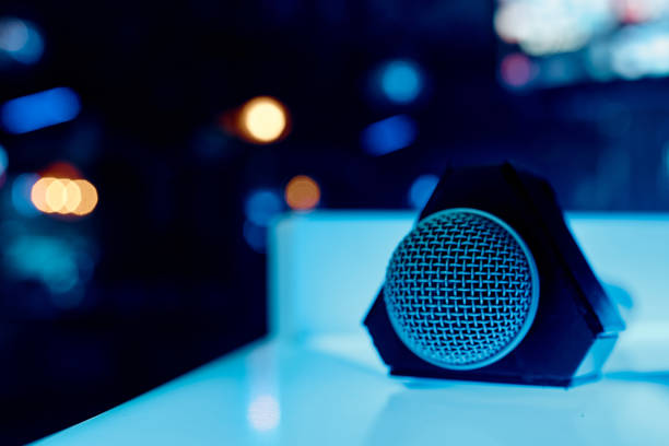 istock The microphone lies on a glowing table with a grid on the camera 1354041490