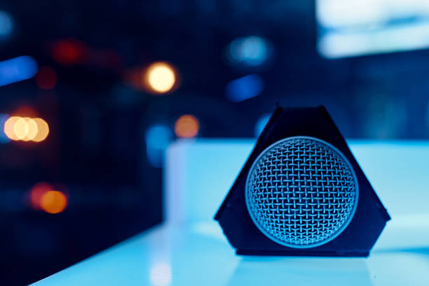 istock The microphone lies on a glowing table with a grid on the camera 1354041658