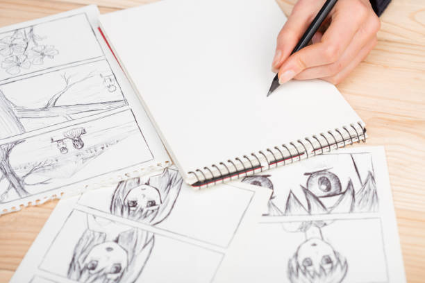 istock Artist drawing an anime comic book in a studio. 1354041836