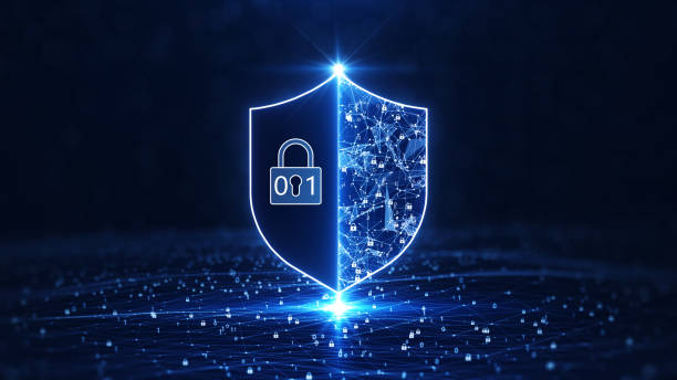 istock Data protection is a concept in cybersecurity and privacy technologies. There is a shield in the middle. A small binary padlock serves as the connection point between the polygons. dark background. 1354042509