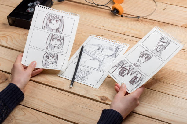istock Artist drawing an anime comic book in a studio. 1354042526