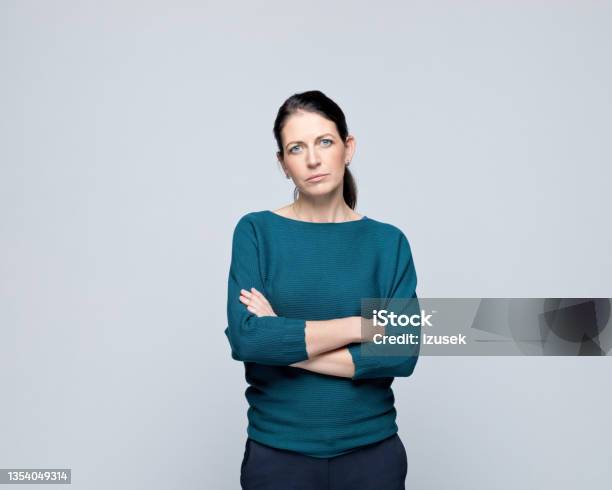 Portrait Of Displeased Mature Woman Stock Photo - Download Image Now - Women, One Woman Only, Sadness