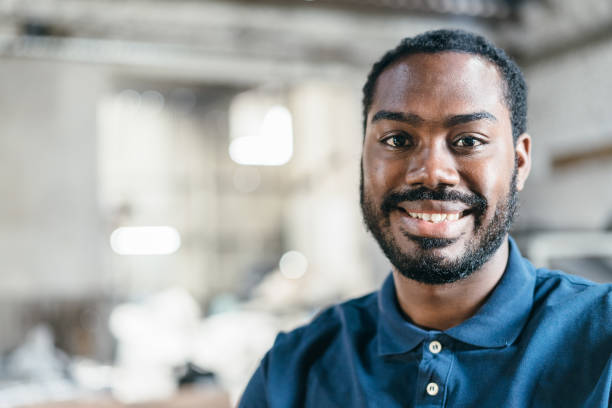 istock Blue collar worker portrait in plastic recycling factory 1354052253